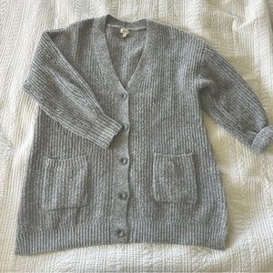 a.n.a. Long, fuzzy, gray SWEATER, never worn. Front Button closure.